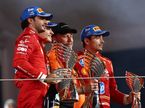Ландо Норрис, Зак Браун и гонщики Ferrari на подиуме в Абу-Даби, фото XPB