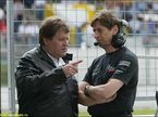 Глава Mercedes Motorsport Норберт Хауг и Марио Илиен (справа), 2002 год