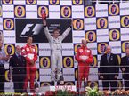 Мика Хаккинен и пилоты Ferrari на подиуме Гран При Великобритании 2001 года