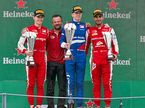 Маркус Армстронг, Роберт Шварцман и Джехан Дарувала на подиуме в Монце