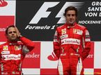 Фернандо Алонсо и Фелипе Масса на подиуме Гран При Германии