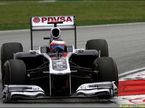 Рубенс Баррикелло за рулем Williams FW33 на трассе в Сепанге