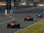 Гран При Японии. Гонщики Marussia Virgin Racing впереди машин HRT
