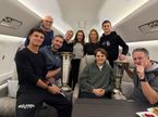 Коллективное фото, сделанное на борту самолёта по пути из Ташкента, фото из социальных сетей