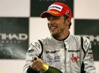 Дженсон Баттон празднует победу в чемпионате мира, 2009 год