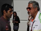 Карун Чандхок и владелец команды Force India Виджей Малья