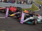 Машины Ferrari, Red Bull и Mercedes после финиша Гран При Великобритании