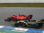 Машины Ferrari и Renault на трассе в Хоккенхайме