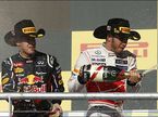 Льюис Хэмилтон и Себастьян Феттель на подиуме Гран При США в Остине