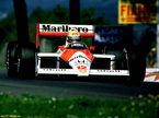 Айртон Сенна за рулём McLaren MP4/4