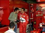Валентино Росси и Михаэль Шумахер в боксах Ferrari (2004 год)