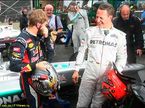 Себастьян Феттель и Михаэль Шумахер после финиша Гран При Бразилии