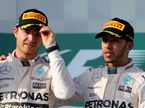 Нико Росберг и Льюис Хэмилтон на подиуме в Мельбурне