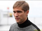Виталий Петров в паддоке Гран При Германии