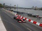 Кими Райкконен за рулём Ferrari F10 на набережной Будапешта