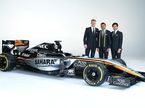 Гонщики Force India с управляющим директором Apsley Tailors Аршадом Махмудом