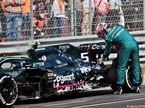 Себастьян Феттель у неисправной машины  Aston Martin