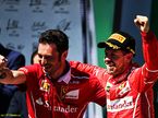 Себастьян Феттель и Джузеппе Виетина, руководитель гоночной бригады Ferrari, на подиуме Гран При Бразилии