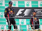Себастьян Феттель и Марк Уэббер на подиуме в Сепанге