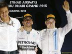 Тото Вольфф, Льюис Хэмилтон и Валттери Боттас на подиуме Гран При Абу-Даби, 2014 год