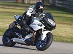 Алекс Дзанарди за рулём мотоцикла